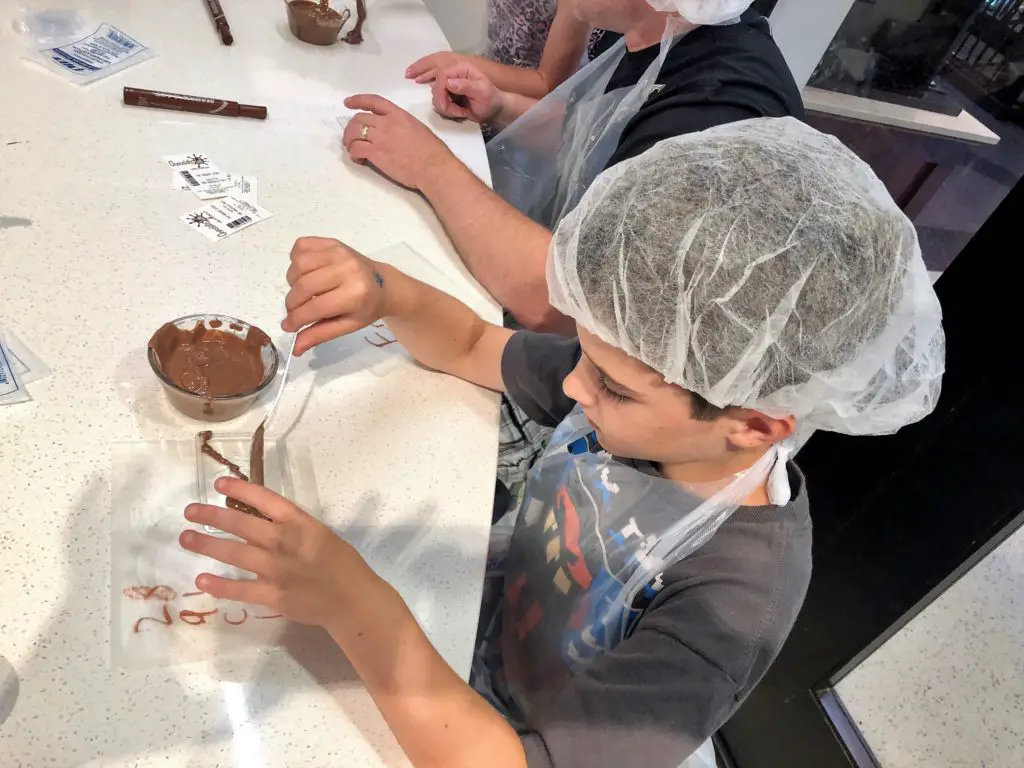 The Chocolate Lab is a fun way to learn more about the Hershey sourcing and production process as well as make your own chocolate creation in a real laboratory environment. Kids love it! #chocolatelab #HersheyStory #HersheyPA #pennsylvania #familytravel